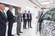 <p>German Minister of Transport Andreas Scheuer (center) opens the driver door of the Brose Concept Car with a hand gesture. Kurt Sauernheimer, CEO of the Brose Group (second from left), shows him and VDA President Bernhard Mattes (second from right) how the technology works.</p>